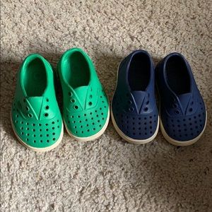 Two pairs of native baby water shoes / sandals.